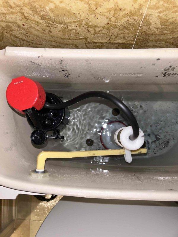 Responded to service call for toilet experiencing intermittent overflow issues, slow refill rates, and incomplete tank filling. Upon inspection, removed tank lid and diagnosed faulty fill valve and float assembly causing improper water level regulation. Adjusted float mechanism and tested flush cycle to verify proper refill timing and water level. Confirmed toilet now operates within normal parameters with complete tank refill and no overflow conditions.