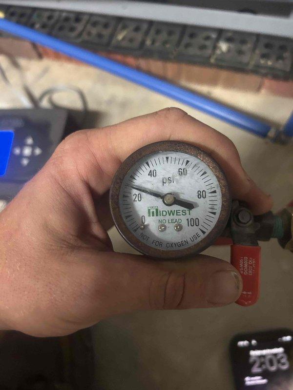 Completed annual care plan tune-up on geothermal system. Performed electrical diagnostics measuring 204 amps with clamp meter and verified system pressures using calibrated gauge. Addressed thermostat internet connectivity issue and confirmed customer-supplied 20x25x4 filter specifications for ongoing maintenance.
