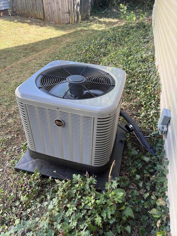 Completed full residential HVAC system installation featuring RUUD 2-ton 15 SEER2 heat pump (model RP14AY24AJ2NA), 2-ton air handler (model RH2TY2417STANNJ), and 10kW heat kit (model RXBH-1724A10J-B). Installed outdoor condenser unit on new pad with snow legs, electrical disconnect box, and whip kit; mounted indoor air handler with transition to existing ductwork. Added refrigerant line insulation, refrigerant line filter, condensate trap, and SS2 coil drain safety water sensor for proper system protection. Installed digital thermostat for system control and HVAC surge protector for electrical protection. Completed all refrigerant line connections, performed system evacuation, charged system to manufacturer specifications, and verified proper pressures using digital manifold gauges. Removed and disposed of existing equipment, obtained applicable permits, and ensured all work met code compliance standards. System tested and operational with 1-year labor warranty and 10-year parts warran