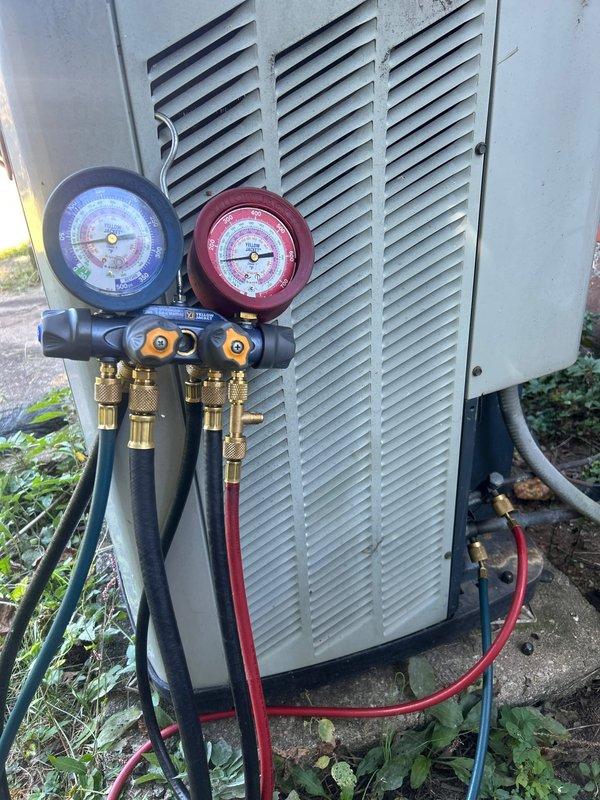 Responded to no cooling complaint on 16-year-old air conditioning system. Located refrigerant leak, performed necessary repair, and pressure tested system to verify leak elimination. Recharged system with customer-supplied R22 refrigerant using manifold gauge set to proper operating pressures and verified cooling operation restored.
