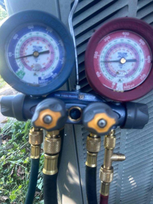 Responded to no cooling complaint on 16-year-old air conditioning system. Located refrigerant leak, performed necessary repair, and pressure tested system to verify leak elimination. Recharged system with customer-supplied R22 refrigerant using manifold gauge set to proper operating pressures and verified cooling operation restored.