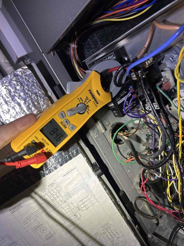 Completed routine maintenance on dual-zone geothermal HVAC system including package unit and split system with humidifier located in basement and attic. Performed electrical diagnostics on control panel using multimeter to verify proper voltage and amperage readings across all circuits, inspected wiring connections and capacitors, and tested ground loop circulation pumps and FC2-GL controller for proper operation. Replaced air filters per maintenance agreement specifications (28x30x2 and 16x25x4) and confirmed all system components operating within normal parameters.