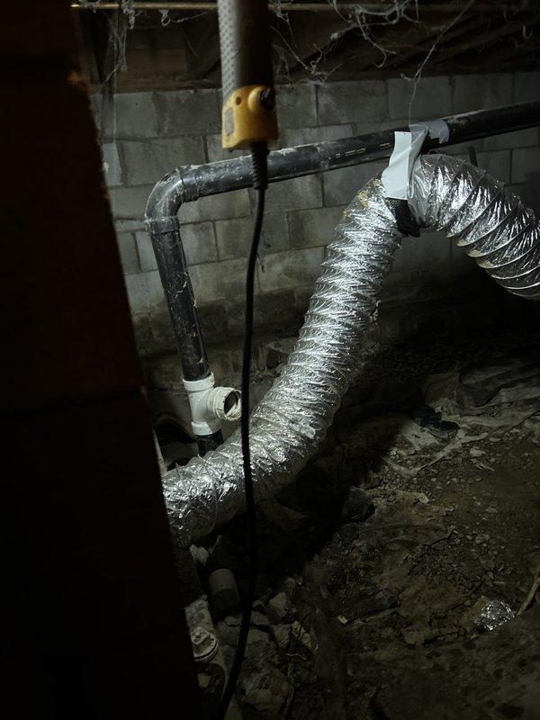Responded to clogged sink line complaint and accessed crawl space beneath residence to inspect drain system. Located and cleared blockage in main drain line using appropriate plumbing equipment. Verified proper drainage flow restored to kitchen sink and tested system to ensure complete resolution of stoppage issue.