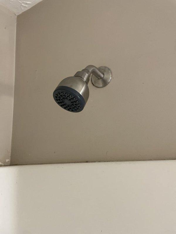 Responded to upstairs bathroom for Delta-branded tub/shower combo faucet with continuous water flow that would not shut off completely. Replaced defective shower valve assembly with customer-provided Delta fixture. Shut off water supply, removed old trim and cartridge, installed new valve components, tested operation to confirm proper shutoff and temperature control, and verified no leaks at connections.