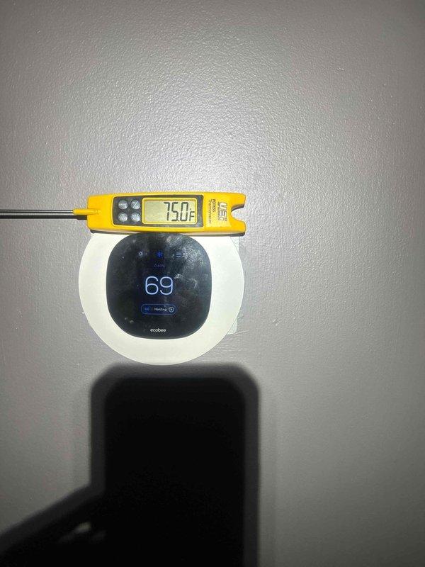Responded to no cooling complaint on 1-year-old system with reported knocking sound from vents. Upon arrival, verified thermostat set to 69°F while supply air temperature measured 75°F, confirming insufficient cooling. Performed diagnostic evaluation of AC system including airflow assessment, refrigerant charge verification, and inspection of ductwork for obstruction or loose components causing knocking noise. System restored to proper operation with adequate cooling and noise issue resolved.