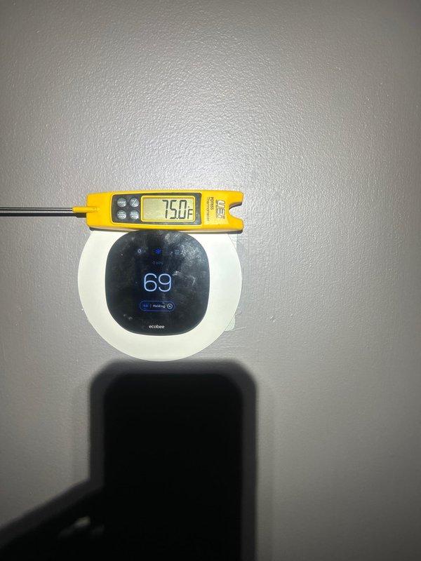 Responded to no cooling complaint on 1-year-old system with reported knocking sound from vents. Upon arrival, verified thermostat set to 69°F while supply air temperature measured 75°F, confirming insufficient cooling. Performed diagnostic evaluation of AC system including airflow assessment, refrigerant charge verification, and inspection of ductwork for obstruction or loose components causing knocking noise. System restored to proper operation with adequate cooling and noise issue resolved.