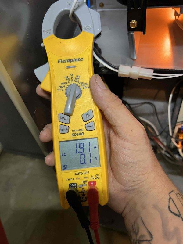 Completed comprehensive Care Plan tune-up maintenance on three air conditioning units and three gas furnaces located in basement and ceiling spaces. Performed diagnostic testing with clamp meter showing amperage draw of 18A and voltage readings, along with temperature differential measurements of 920°F and 82°F on HVAC equipment. Inspected all systems for proper operation, tested electrical components, and verified equipment performance parameters were within manufacturer specifications.