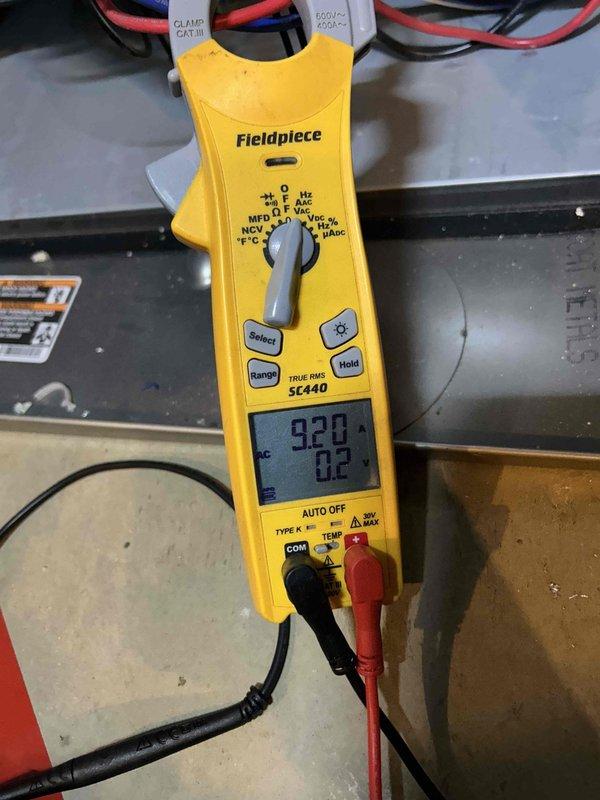 Completed comprehensive Care Plan tune-up maintenance on three air conditioning units and three gas furnaces located in basement and ceiling spaces. Performed diagnostic testing with clamp meter showing amperage draw of 18A and voltage readings, along with temperature differential measurements of 920°F and 82°F on HVAC equipment. Inspected all systems for proper operation, tested electrical components, and verified equipment performance parameters were within manufacturer specifications.