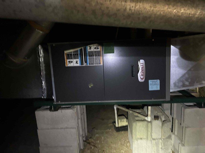 Completed preventive maintenance on a 10-year-old Lennox gas furnace and air conditioning system with indoor unit located in crawlspace. Performed comprehensive inspection of blower assembly and squirrel cage fan, verifying proper operation and blade condition. Supplied and installed 16x25x1 air filter as part of club membership service, ensuring optimal airflow and system efficiency.
