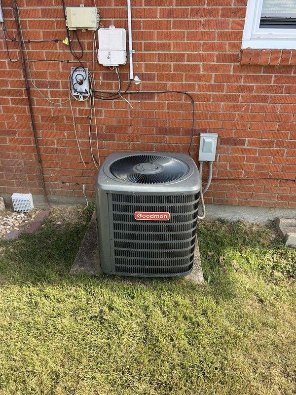 Completed Gold Level preventative maintenance on single-system residential air conditioning unit. Performed comprehensive inspection of Goodman outdoor condensing unit and indoor air handler located in closet, including filter assessment per customer-provided filter arrangement. Documented equipment condition with photographs showing exterior unit operational status and crawl space air handler installation with standing water present on vapor barrier, which may require future monitoring for drainage concerns.