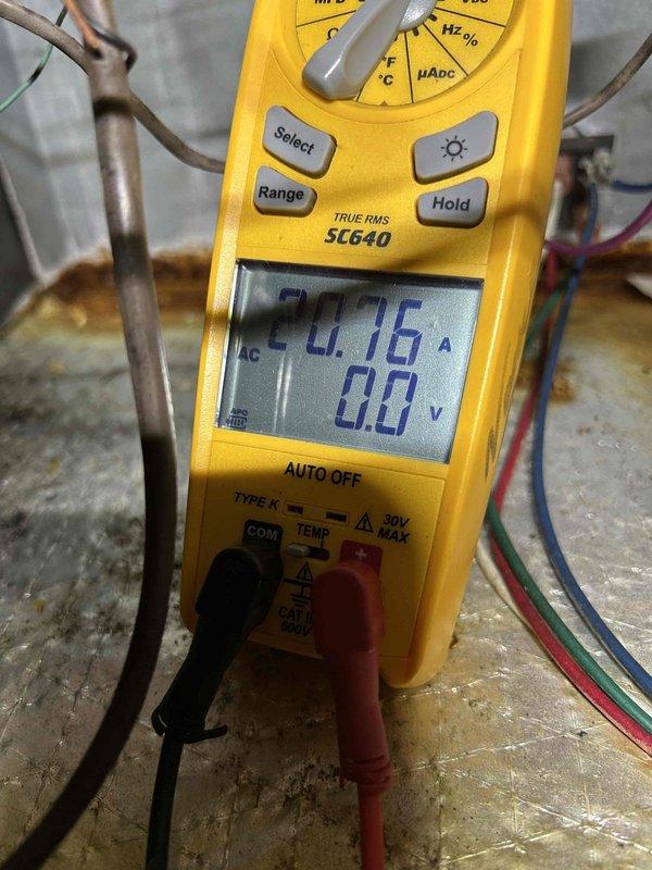 Completed preventive maintenance tune-up on heat pump and air handler system located in crawlspace. Performed comprehensive system inspection and testing using calibrated diagnostic equipment. Measured and recorded electrical parameters including amperage draw to verify proper system operation. Documented ambient temperature reading of 57°F in crawlspace environment. Inspected all accessible components including refrigerant lines, electrical connections, and insulation integrity. System found operating within manufacturer specifications with no deficiencies noted at time of service.