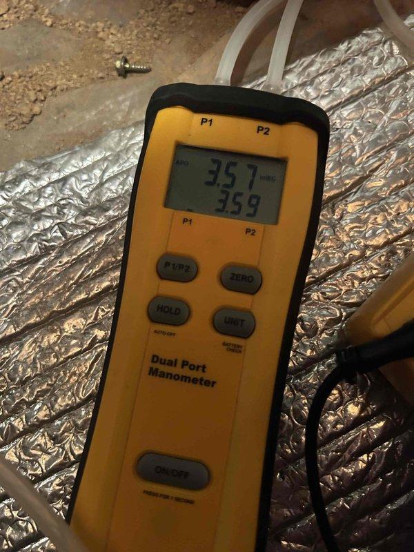 Completed fall furnace maintenance tune-up on crawlspace unit accessed through interior closet. Performed comprehensive system inspection including gas pressure testing, measuring inlet pressure at 35.7" and outlet pressure at 35.9" W.C., and verified electrical draw at 22.1 amps. Installed #35 humidifier pad as part of seasonal maintenance protocol. All operating parameters within manufacturer specifications, and system functioning properly with no issues identified.