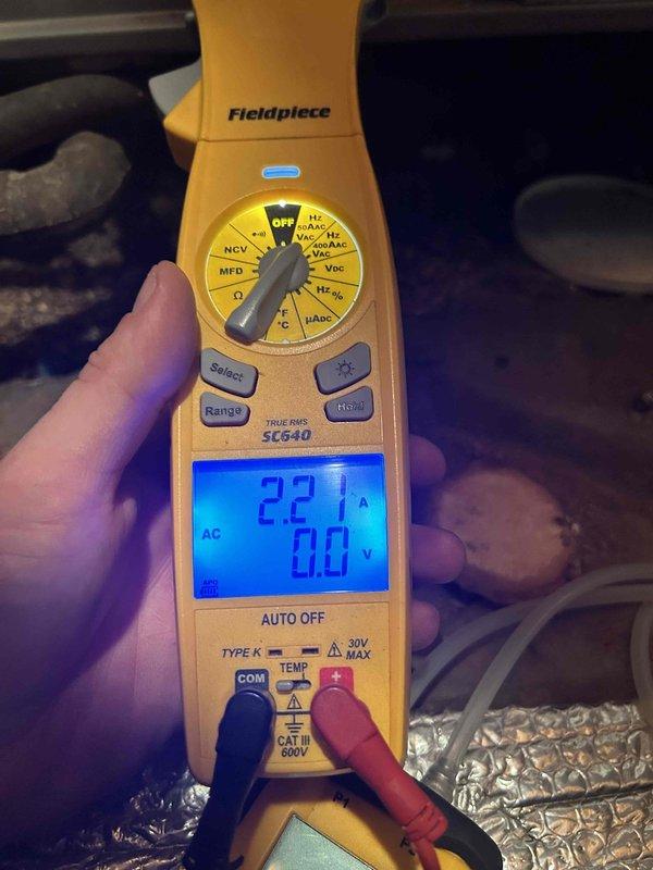 Completed fall furnace maintenance tune-up on crawlspace unit accessed through interior closet. Performed comprehensive system inspection including gas pressure testing, measuring inlet pressure at 35.7" and outlet pressure at 35.9" W.C., and verified electrical draw at 22.1 amps. Installed #35 humidifier pad as part of seasonal maintenance protocol. All operating parameters within manufacturer specifications, and system functioning properly with no issues identified.