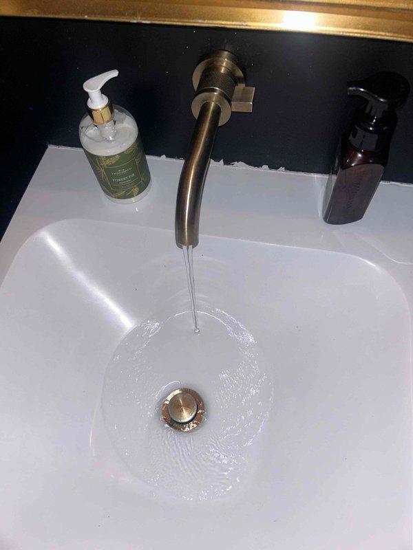 Completed routine plumbing inspection of bathroom fixtures, focusing on vanity area and sink operation. Tested faucet functionality, water flow, and drainage system; verified proper operation of wall-mounted fixtures and confirmed no visible leaks or concerns. All components found to be in good working order.