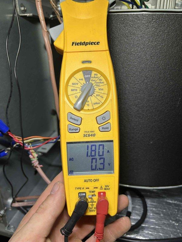 Completed Gold Level prepaid maintenance on single-system heat pump and air handler. Performed comprehensive system inspection including electrical diagnostics with multimeter showing 180A and 0.3V AC readings at equipment. Inspected and photographed condensate pump assembly with PVC drain configuration, P-trap, and safety switches in crawlspace location, confirming proper operation and drainage into containment pan. All components operating within normal parameters with no deficiencies noted.