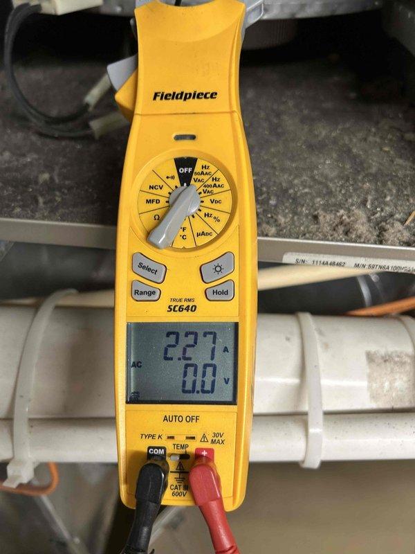 Performed comprehensive AC tune-up maintenance on basement-installed air conditioning system. Conducted electrical diagnostics using clamp meter, recording voltage at 227V and amperage draw at 0.30A to verify proper system operation. Utilized dual port manometer to measure system pressures, with readings of 10.3 and 10.0 recorded for P1 and P2 ports respectively. Installed new 16x25x4 air filter as part of routine maintenance protocol. All electrical parameters tested within normal operating specifications, and system found to be functioning properly with no issues identified during inspection.