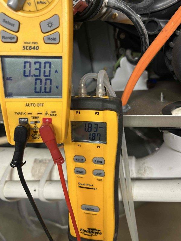 Performed comprehensive AC tune-up maintenance on basement-installed air conditioning system. Conducted electrical diagnostics using clamp meter, recording voltage at 227V and amperage draw at 0.30A to verify proper system operation. Utilized dual port manometer to measure system pressures, with readings of 10.3 and 10.0 recorded for P1 and P2 ports respectively. Installed new 16x25x4 air filter as part of routine maintenance protocol. All electrical parameters tested within normal operating specifications, and system found to be functioning properly with no issues identified during inspection.