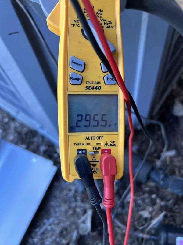Performed comprehensive preventive maintenance service on residential Carrier air conditioning system. Conducted visual inspection of outdoor condensing unit, verified proper installation and clearances, and measured operating amperage at 29.55 amps to confirm system is drawing within normal parameters. Unit found in good operating condition with all components functioning as designed.