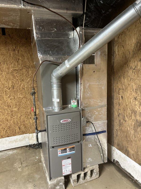 Completed Gold Level preventive maintenance on single-zone residential HVAC system with Lennox gas furnace and air conditioning unit located in basement. Performed comprehensive inspection of heating and cooling components, verified electrical connections and amperage draw using digital multimeter (0.98A reading recorded), checked condensate pump operation, inspected ductwork and connections, and replaced 16x20x1 air filter supplied by customer. All system components tested and operating within manufacturer specifications.