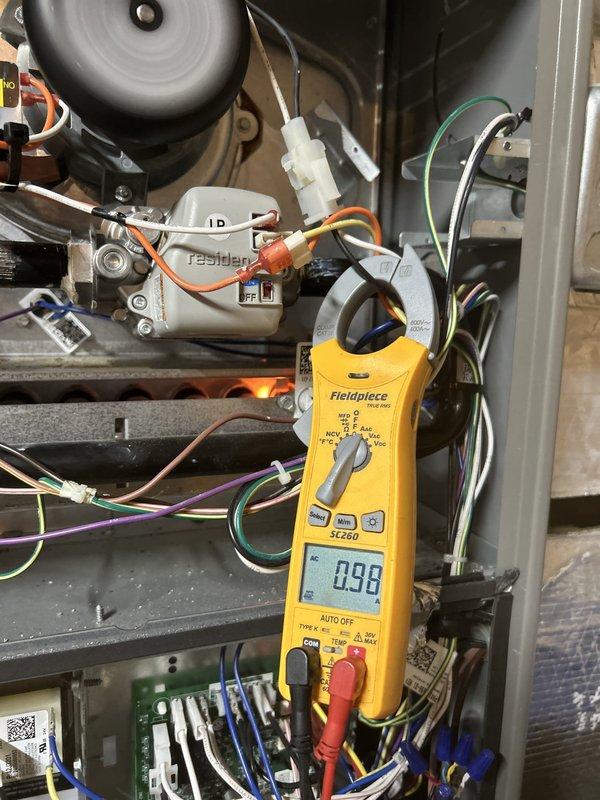 Completed Gold Level preventive maintenance on single-zone residential HVAC system with Lennox gas furnace and air conditioning unit located in basement. Performed comprehensive inspection of heating and cooling components, verified electrical connections and amperage draw using digital multimeter (0.98A reading recorded), checked condensate pump operation, inspected ductwork and connections, and replaced 16x20x1 air filter supplied by customer. All system components tested and operating within manufacturer specifications.