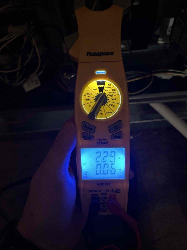 Completed scheduled Care Plan tune-up on air conditioning system and gas furnace located in attic. Performed comprehensive inspection of both units, including visual examination of heat exchanger interior which showed clean metallic surfaces with no signs of cracks or deterioration. Measured electrical parameters using clamp meter, recording 229 volts AC supply with 0.06 amp draw, indicating normal operating conditions. Verified proper system operation and confirmed equipment functioning within manufacturer specifications.