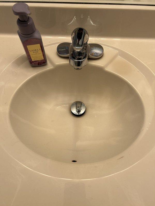 Performed routine maintenance flush on a 6-year-old gas tanked water heater located in the utility room. Conducted comprehensive whole home plumbing inspection, examining all visible fixtures and connections. All plumbing components, including bathroom sink drains and P-trap assemblies, were found to be in standard working condition with no leaks or deficiencies noted.