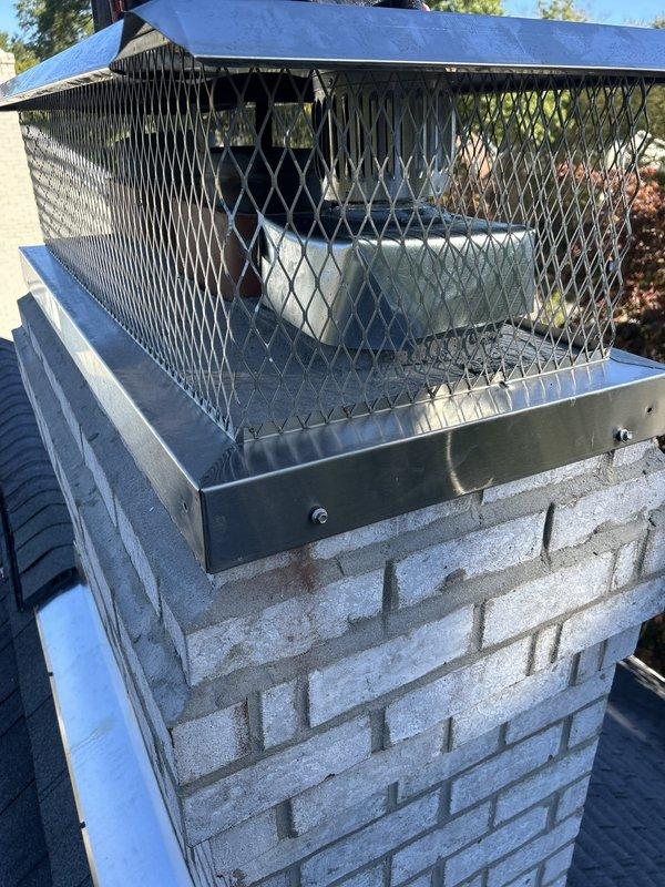 Installed proper venting system for HydroJet water heater by running a protective sleeve down the existing chimney shaft and routing 3-inch double-walled metal exhaust pipe through the sleeve to exit at the chimney top. Connected exhaust piping to water heater and verified proper venting operation to ensure safe combustion gas exhaust and code compliance.