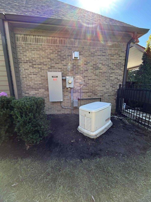 Relocated Generac residential standby generator unit to improved position on concrete pad to optimize airflow circulation and redirect exhaust discharge away from structure. Installed 3/4" rigid fuel pipe connection to accommodate existing flexible fuel line reconnection, ensuring proper fuel supply integration with repositioned generator while maintaining code compliance and manufacturer specifications.