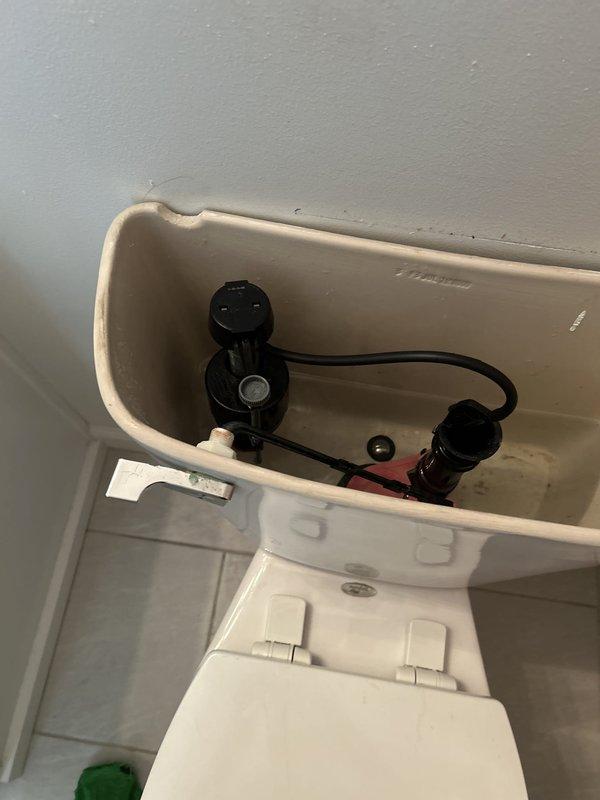 Replaced customer-supplied Delta lavatory faucet with 4-inch spread configuration on bathroom vanity. The new brushed nickel two-handle faucet was successfully installed on the vanity's integrated oval sink basin, with all connections properly sealed and tested for leaks.
