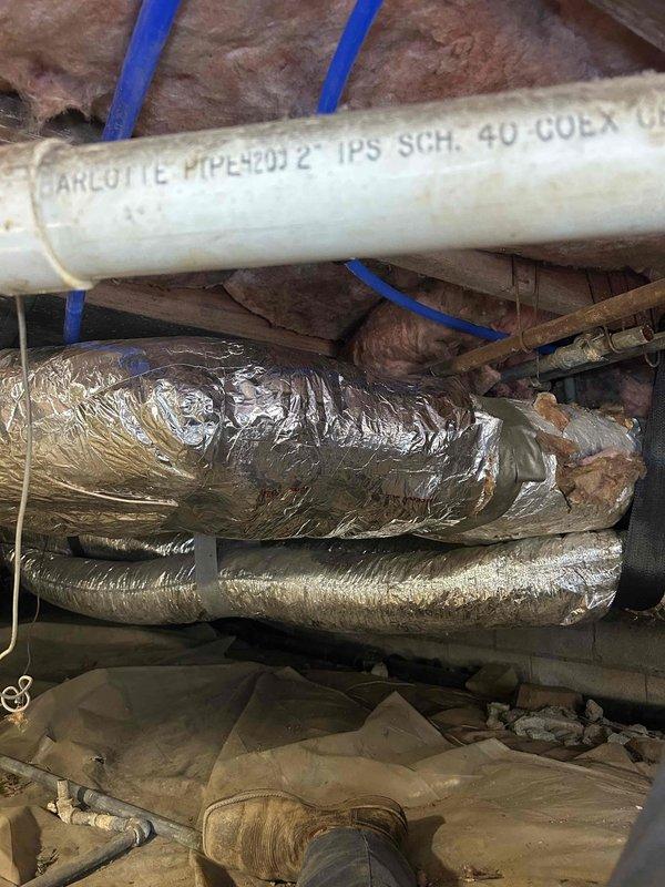 Repaired and secured HVAC ductwork in crawlspace by re-insulating exposed flexible duct runs and installing proper strapping to support sagging sections. Ensured all flex duct was properly supported per code requirements and insulation was restored to maintain system efficiency.