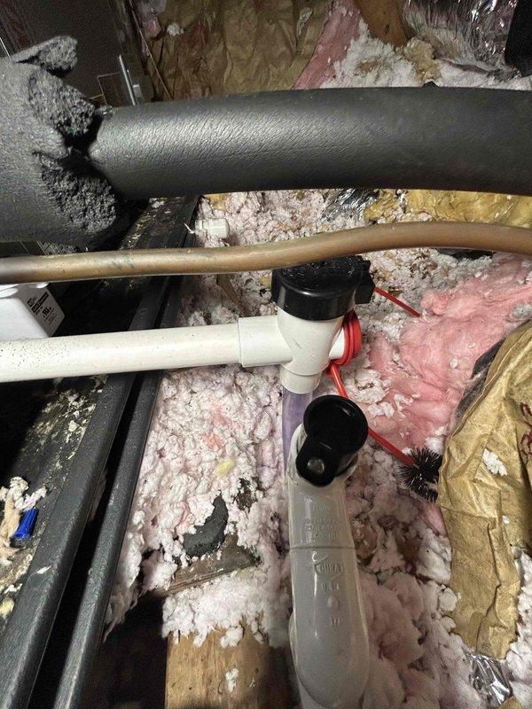 Completed full residential HVAC system installation in attic space as part of promotional program. Installed Lennox ML14KP1-024-230A02 heat pump system with CBK43UHET-024-DV-01 air handler and 10KW heat kit. Removed existing return flex ductwork to facilitate equipment access and replaced with new flex upon completion. Installed Lennox L40 digital thermostat for system control.

Installed auxiliary drain pan with proper plywood support beneath air handler per code requirements. Installed condensate trap and verified condensation line is clear and flowing properly throughout entire drainage system. Installed safety switches on equipment. Replaced standard 1" pleated air filter.

Performed comprehensive ductwork sealing throughout entire attic duct system to eliminate air leakage and improve system efficiency. Inspected all duct connections and sealed penetrations to ensure proper airflow and system performance. Verified all equipment is properly secured, leveled, and operational. System