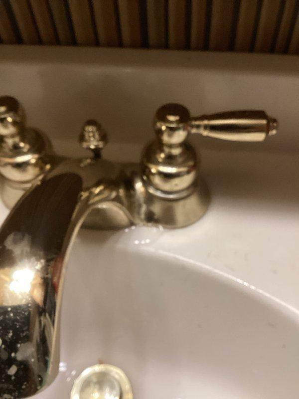 Completed routine plumbing inspection of bathroom fixtures and sink area as part of preventative service agreement. Documented condition of chrome and brass faucet assemblies, verified proper operation of hot and cold water handles, and assessed overall plumbing fixture status for maintenance planning purposes.