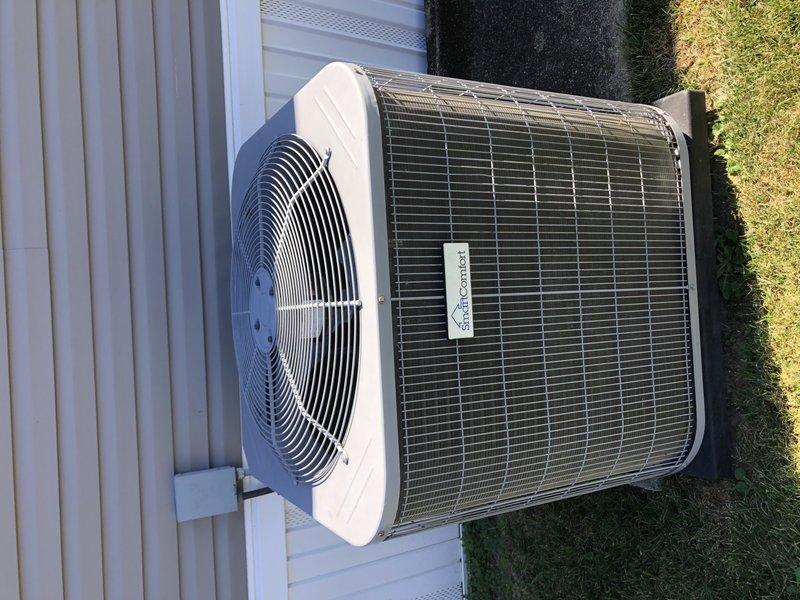 Responded to no cooling complaint on 6-year-old electric heat pump system (Model E7ED-015H1). Customer reported multiple refrigerant additions since installation, recent coil freeze-up that has since thawed, and suspected blower motor failure. Upon arrival, conducted comprehensive system diagnostics including electrical testing, refrigerant pressure checks, and airflow verification. Inspected indoor air handler and outdoor condensing unit, both showing signs of previous service interventions. Documented equipment specifications and current system condition with photographs. Advised customer that manufacturer warranty has expired due to lack of equipment registration within required timeframe. Discussed potential causes of recurring refrigerant loss including possible leak in evaporator coil or refrigerant lines, and evaluated blower motor operation and thermostat functionality to determine necessary repairs for restoring proper cooling operation.