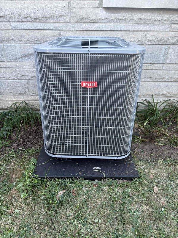 Completed full residential dual fuel HVAC system installation featuring Bryant 16 SEER2 equipment. Installed 97% AFUE 60,000 BTU gas furnace (model GH5SAN530000A) with matching evaporator coil (model 916SA48060M17) in crawl space, requiring removal and reinstallation of crawl space frame to accommodate new furnace dimensions. Installed outdoor condensing unit (model CVAMA3017XMA) on new equipment pad with snow legs for elevation and proper drainage. System includes S200 HP programmable thermostat for optimal climate control and energy management.

Installation incorporated comprehensive safety and efficiency components including trap assembly, SS2 coil drain safety water sensor, "Ceiling Saver" overflow drain pan with secondary water sensor for leak protection, transition fittings to integrate with existing ductwork, and standard-sized air filter rack for routine maintenance access. Outdoor unit installation included electrical whip kit, disconnect box for service accessibility, insula