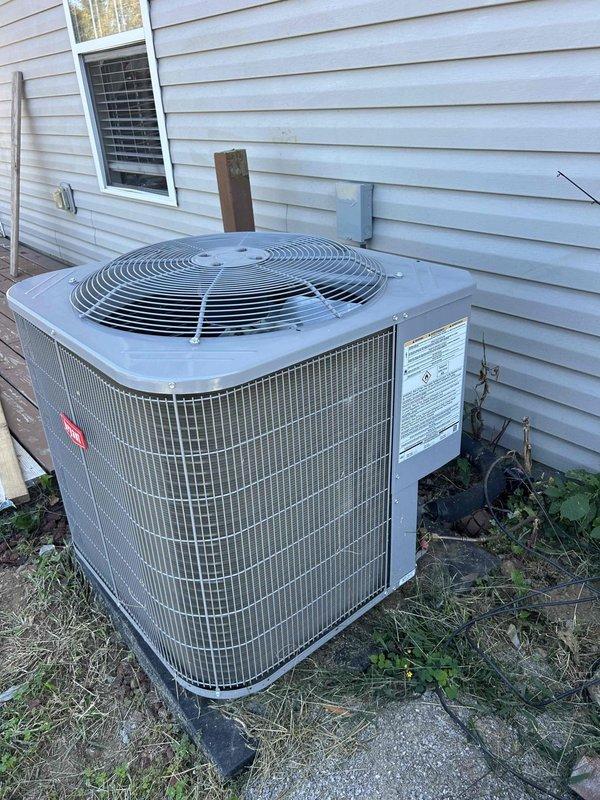 Performed comprehensive HVAC maintenance on heat pump/air handler system located in garage. Conducted electrical diagnostics using calibration meter, measuring voltage and amperage readings at the outdoor condenser unit to verify proper system operation. Inspected outdoor condenser unit positioned on concrete pad, checking fan operation, coil condition, and overall equipment functionality. Verified all electrical connections and components including capacitor. System operating within normal parameters upon completion of maintenance inspection. Customer provides their own air filter sized 16 3/8 x 21 1/2 x 1 inch.