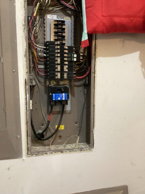 Conducted electrical estimate for car charging station installation in attached garage. Assessed existing electrical panel located adjacent to proposed charger mounting location, documented current breaker configuration and available capacity, and evaluated optimal routing for dedicated circuit to support Level 2 EV charging equipment on exterior garage wall near service entrance.