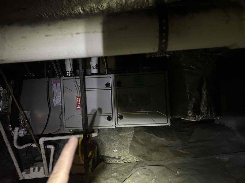 Completed comprehensive Care Plan tune-up on dual HVAC system with air conditioning and gas furnace units located in attic and basement. Performed full preventive maintenance protocol on both systems including inspection of all major components, measurement of system pressures and temperatures, verification of electrical connections, and assessment of condensate drainage systems. Documented static pressure readings of 340 on basement unit using digital manometer to ensure proper airflow and system performance. Customer provided filters for installation per club membership agreement. Both systems operating within manufacturer specifications with no deficiencies noted at time of service.