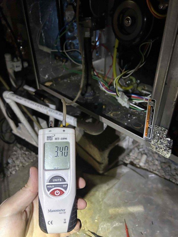 Completed comprehensive Care Plan tune-up on dual HVAC system with air conditioning and gas furnace units located in attic and basement. Performed full preventive maintenance protocol on both systems including inspection of all major components, measurement of system pressures and temperatures, verification of electrical connections, and assessment of condensate drainage systems. Documented static pressure readings of 340 on basement unit using digital manometer to ensure proper airflow and system performance. Customer provided filters for installation per club membership agreement. Both systems operating within manufacturer specifications with no deficiencies noted at time of service.