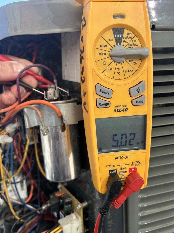 Completed preventive maintenance tune-up on dual HVAC systems located in attic per Care Plan agreement. Performed comprehensive inspection of both heat pump and air handler units, including testing of TITAN PRO dual-run capacitor (30+5 MFD, 370/440V) which tested within acceptable specifications at 5.02 MFD using calibrated Fieldpiece SC640 multimeter. Verified all electrical connections, control board functionality, and proper wire routing on both systems. All components operating within normal parameters; customer to provide replacement filters as needed.