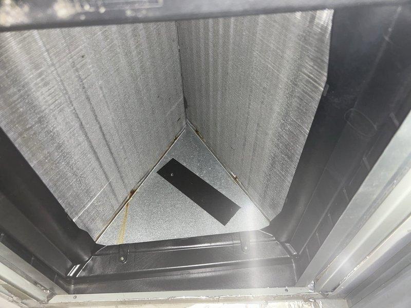Performed preventive maintenance tune-up on Trane air handler unit (Model TEMA40B36S31SBA, Serial 18234KGA3V, manufactured 6/2018) located in garage as part of recurring care plan service. Conducted comprehensive system inspection including interior ductwork and air handling components, verified unit specifications and operational parameters, and documented equipment condition through photographic records. Customer provided filters for installation as part of routine maintenance protocol.
