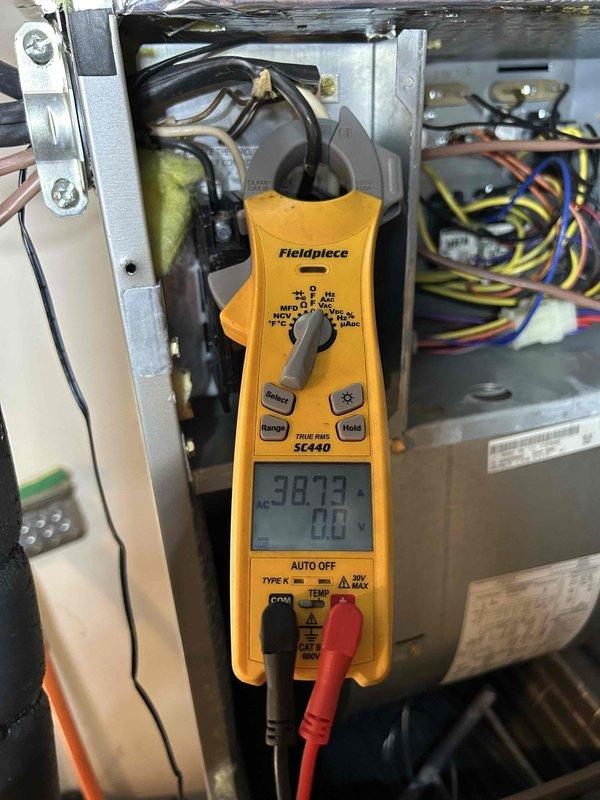 Completed Gold Level preventive maintenance on single heat pump and air handler system located in garage. Performed comprehensive system inspection including electrical diagnostics with clamp meter, measuring amperage draws and voltage readings to verify proper component operation. Checked refrigerant lines, wiring connections, and all internal components for proper function and safety. Customer supplies 20x20x1 filter. All measurements within manufacturer specifications, system operating normally.