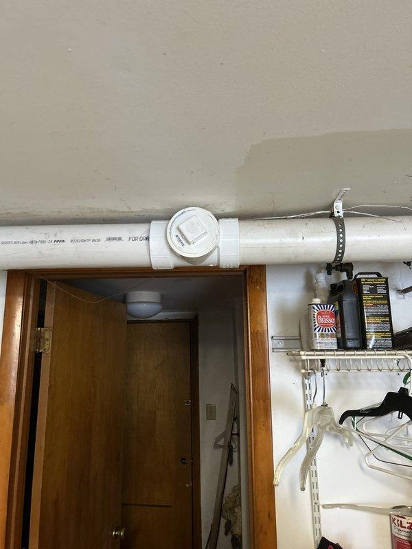 Completed comprehensive sewer line replacement addressing multiple breaks in the existing drainage system. Removed and replaced deteriorated lead toilet flange and branch arm with new Schedule 40 PVC components. Replaced one 4-inch sanitary tee, one 4-inch x 2-inch wye fitting, and one 4-inch wye fitting throughout the affected drainage run.

Installed approximately 30 linear feet of new Schedule 40 PVC sewer piping, replacing deteriorated sections from the toilet flange through to the second identified break location. Successfully tied new PVC drainage system back into existing PVC piping in the washroom area, ensuring proper flow and connection integrity.

Gained access through upstairs wall to locate and expose the existing cast-iron main vent stack. Assessed condition of vent stack and identified suitable connection point on structurally sound section of cast iron. Successfully transitioned and reconnected new PVC drainage system to existing vent stack, accounting for deteriorated 