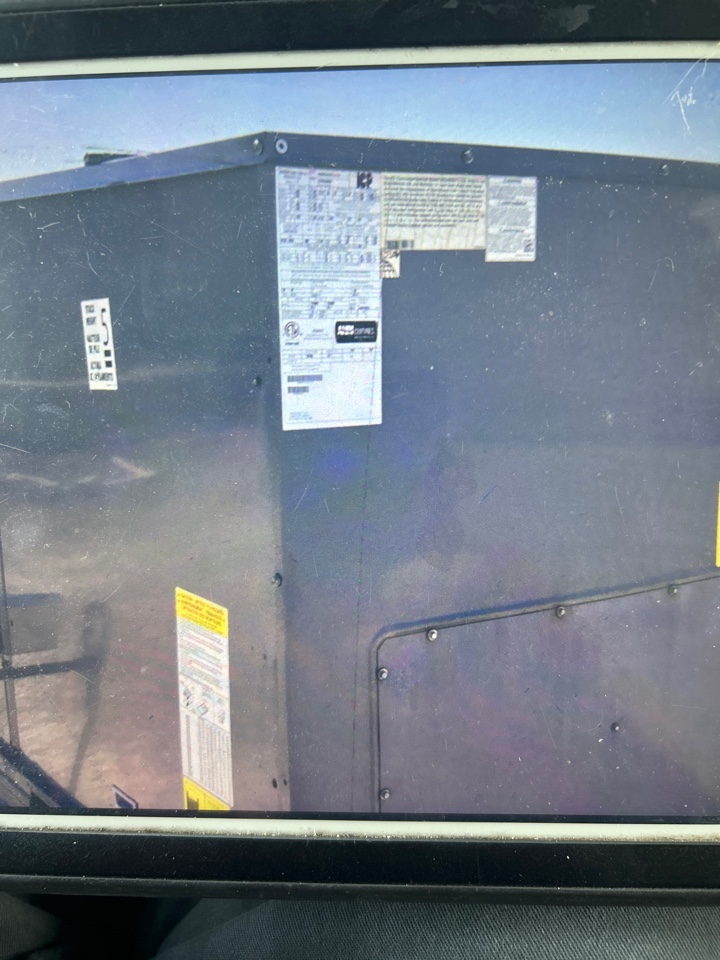 Servicing a Carrier package unit for a business in Carrollton