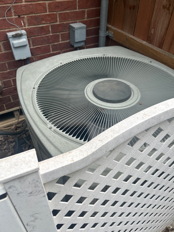 Servicing a Trane condenser for a family in Irving
