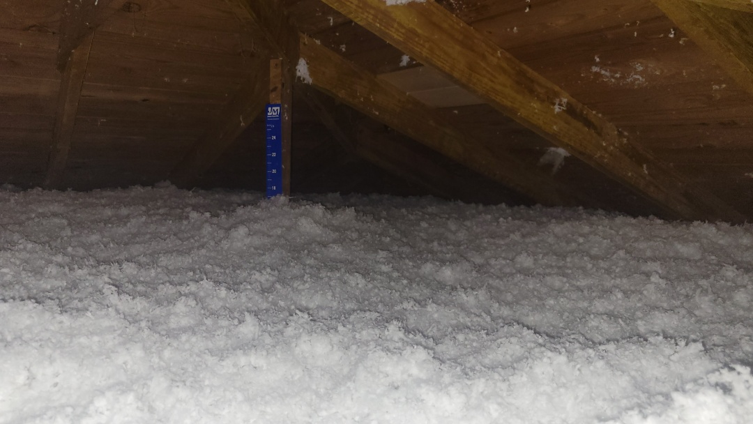 Installation of Blown Attic Insulation R-38 value