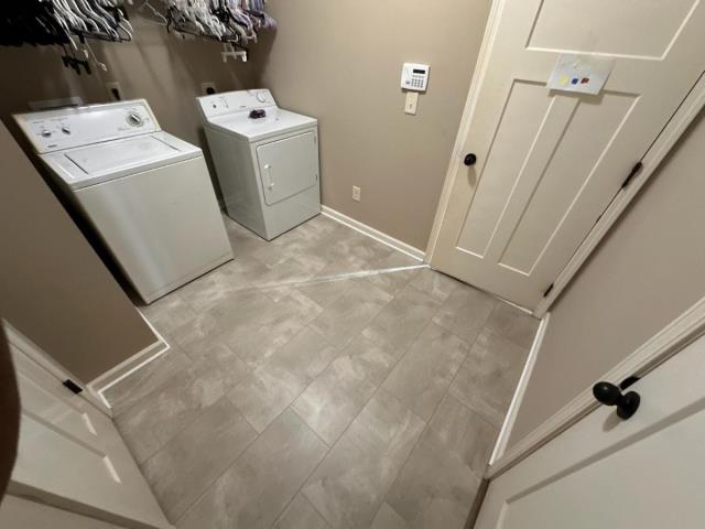Installing luxury vinyl tile in a laundry room in Bremen today!