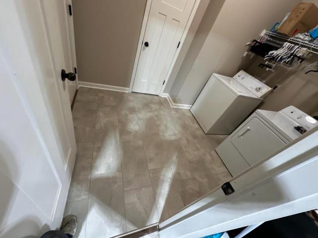 Installing luxury vinyl tile in a laundry room in Bremen today!