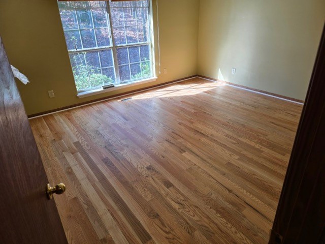 We installed new red oak hardwood and finished with a natural stain at this home in Lineville. We installed new red oak hardwood and finished with a natural stain at this home in Lineville.