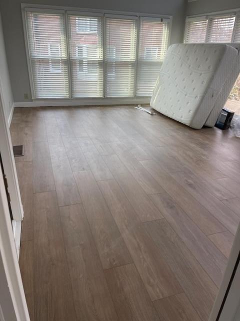 We installed click/lock LVP in a sunroom at this Alpharetta, GA home. 