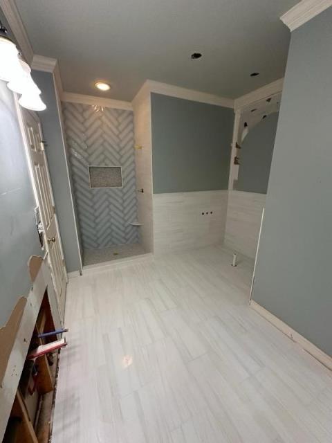 Installing tile in this master bath in Alpharetta, GA.